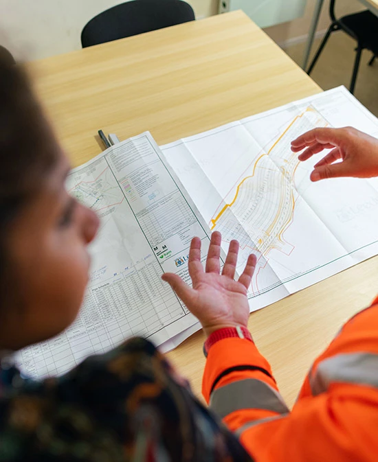 surveyor researching a map