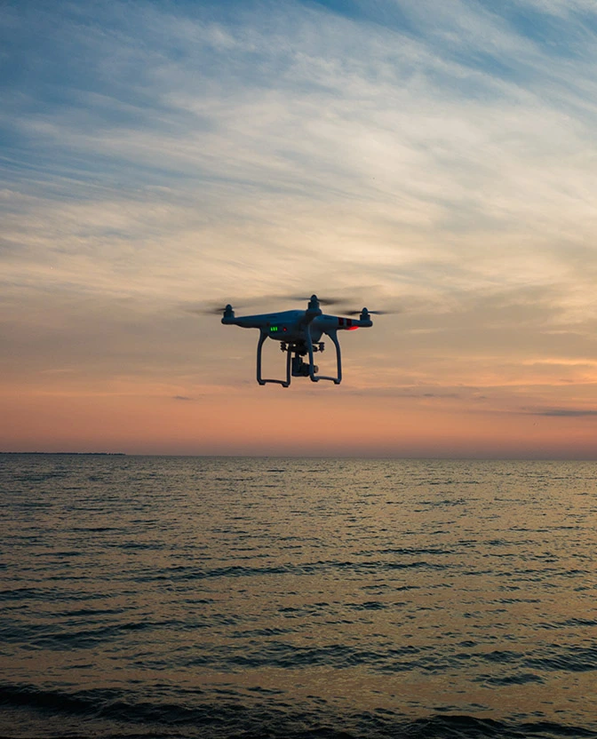 drone flying over water